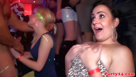 Busty brunette blonde has a hot group sex on the dance floor