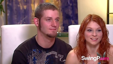 Interracial group sex with a red head and a blonde