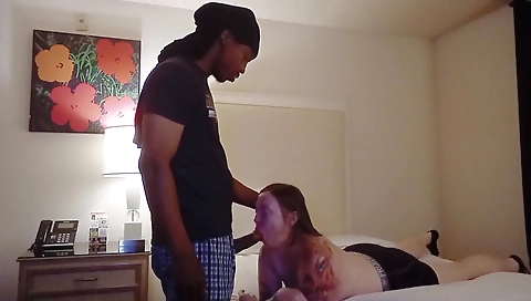 Red head and tattooed redhead have an interracial threesome