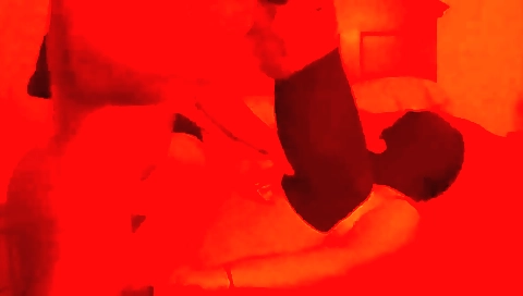 Big ass redhead with a tattooed face in a red dress