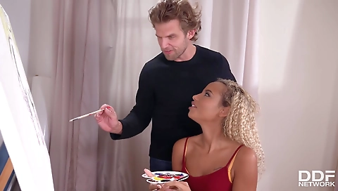 Busty ebony babe with a tattooed pussy is having fun