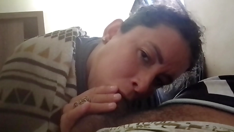 Ebony babe with hairy pussy giving a deep throat blowjob