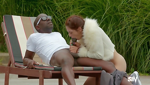 Interracial porn video with a brunette and a blonde