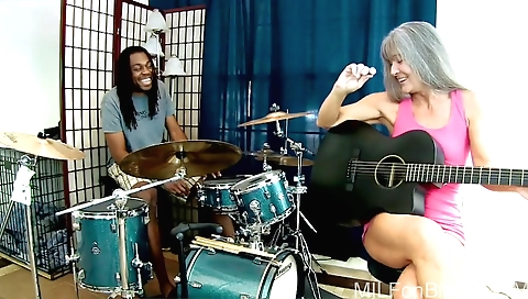 Busty milf in her black dress is getting a hot boner